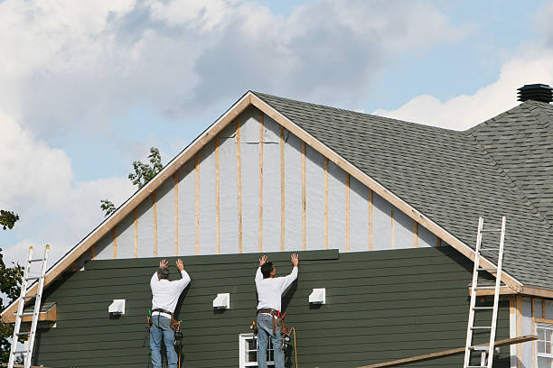 Professional Siding Installation technician working in Highland Park, PA